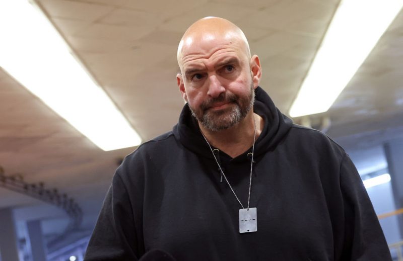 WASHINGTON, DC - DECEMBER 12: U.S. Sen. John Fetterman (D-PA) speaks to reporters before a Senate luncheon at the U.S. Capitol on December 12, 2023 in Washington, DC. Fetterman spoke on military aid to Ukraine. (Photo by Kevin Dietsch/Getty Images)