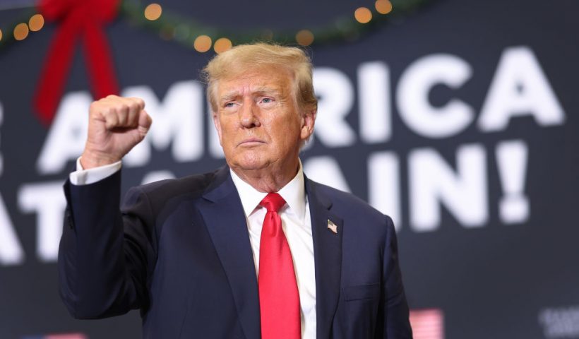 WATERLOO, IOWA - DECEMBER 19: Republican presidential candidate and former U.S. President Donald Trump gestures as he wraps up a campaign event on December 19, 2023 in Waterloo, Iowa. Iowa Republicans will be the first to select their party's nomination for the 2024 presidential race, when they go to caucus on January 15, 2024. (Photo by Scott Olson/Getty Images)