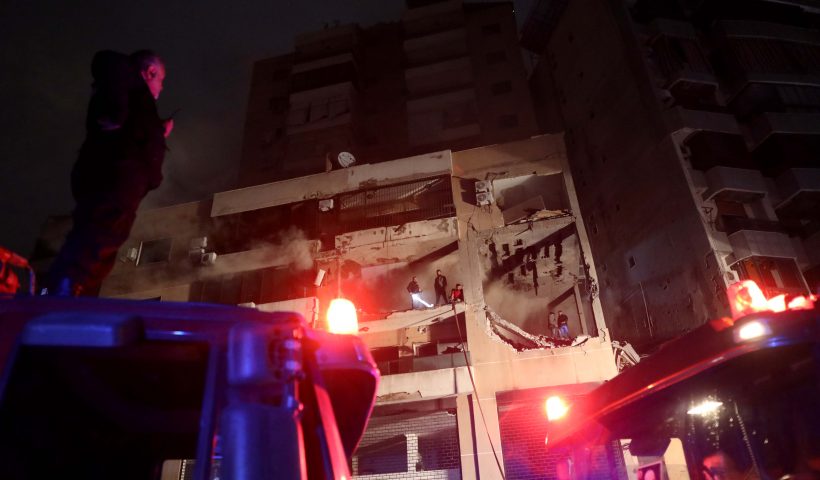 BEIRUT, LEBANON - JANUARY 2: Firefighters and civil defense are seen in a damaged building that was allegedly targeted by an Israeli drone strike on January 2, 2024 in Dahiyeh, a suburb of Beirut, Lebanon. Shortly after the blast, Hamas confirmed the death of Saleh al-Arouri, deputy head of its political bureau and two other officials. An earlier report from Lebanon's National News Agency said four people had died in the blast and alleged it was an Israeli drone strike. (Photo by Marwan Tahtah/Getty Images)
