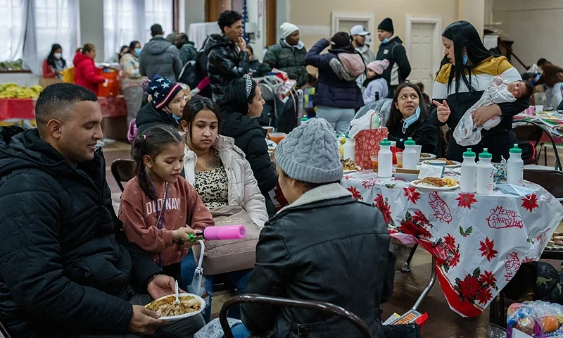 A Three Kings Day celebration for migrants, offering free clothes, food and presents is held at Calvary United Methodist Church in the Bronx Borough of New York City on January 6, 2024. (Photo by Adam GRAY / AFP) (Photo by ADAM GRAY/AFP via Getty Images)