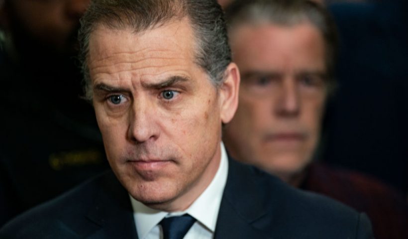 WASHINGTON, DC - JANUARY 10:Hunter Biden, son of U.S. President Joe Biden listens as his lawyer Abbe Lowell speaks to the press outside a House Oversight Committee meeting on January 10, 2024 in Washington, DC. The committee is meeting today as it considers citing him for Contempt of Congress. (Photo by Kent Nishimura/Getty Images)