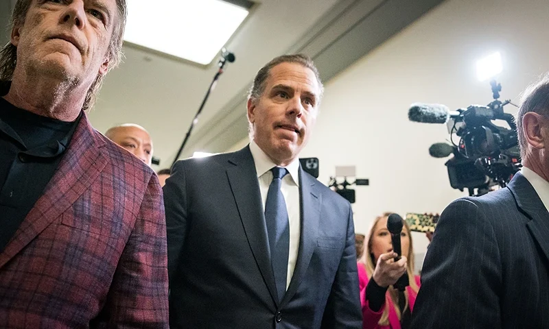WASHINGTON, DC - JANUARY 10: Hunter Biden, son of U.S. President Joe Biden, flanked by Kevin Morris, left, and Abbe Lowell, right, departs a House Oversight Committee meeting on January 10, 2024 in Washington, DC. The committee is meeting today as it considers citing him for contempt of Congress. (Photo by Kent Nishimura/Getty Images)