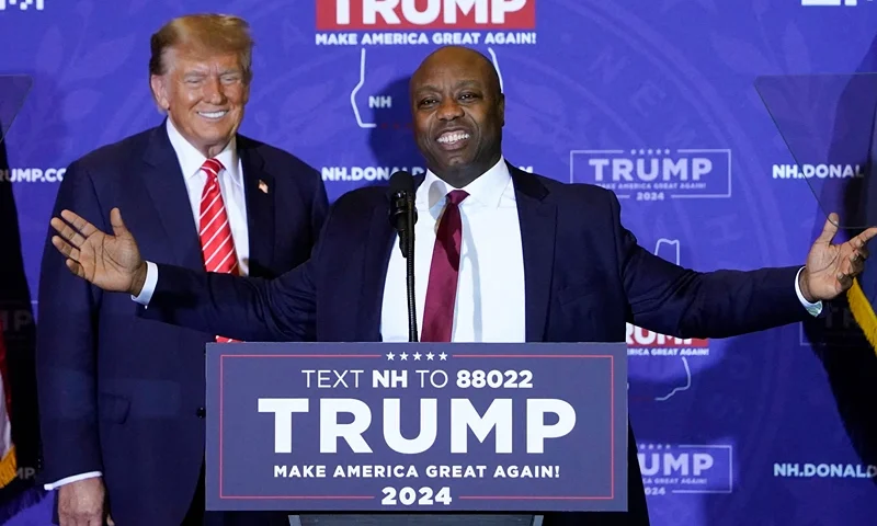 US-POLITICS-VOTE-TRUMP US Republican Senator from South Carolina Tim Scott speaks as Republican presidential hopeful and former US President Donald Trump listens during a campaign event in Concord, New Hampshire, on January 19, 2024. Senator Tim Scott announces his endorsement of former president Trump to be the Republican presidential candidate in a boost to the former president's bid to secure his party's backing to retake the White House. (Photo by TIMOTHY A. CLARY / AFP) (Photo by TIMOTHY A. CLARY/AFP via Getty Images)