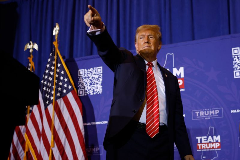 CONCORD, NEW HAMPSHIRE - JANUARY 19: Republican presidential candidate and former President Donald Trump acknowledges supporters at the end of a campaign rally at the Grappone Convention Center on January 19, 2024 in Concord, New Hampshire. New Hampshire voters will weigh in next week on the Republican nominating race with their first-in-the-nation primary, about one week after Trump's record-setting win in the Iowa caucuses. Former UN Ambassador and former South Carolina Gov. Nikki Haley is hoping for a strong second-place showing so to continue her campaign into Nevada and South Carolina. (Photo by Chip Somodevilla/Getty Images)