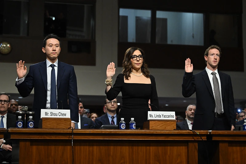 US-TECHNOLOGY-INTERNET-CHILD-EXPLOITATION
(L-R) Shou Zi Chew, CEO of TikTok; Linda Yaccarino, CEO of X; and Mark Zuckerberg, CEO of Meta, are sworn in during the US Senate Judiciary Committee hearing, "Big Tech and the Online Child Sexual Exploitation Crisis," in Washington, DC, on January 31, 2024. (Photo by ANDREW CABALLERO-REYNOLDS / AFP) (Photo by ANDREW CABALLERO-REYNOLDS/AFP via Getty Images)