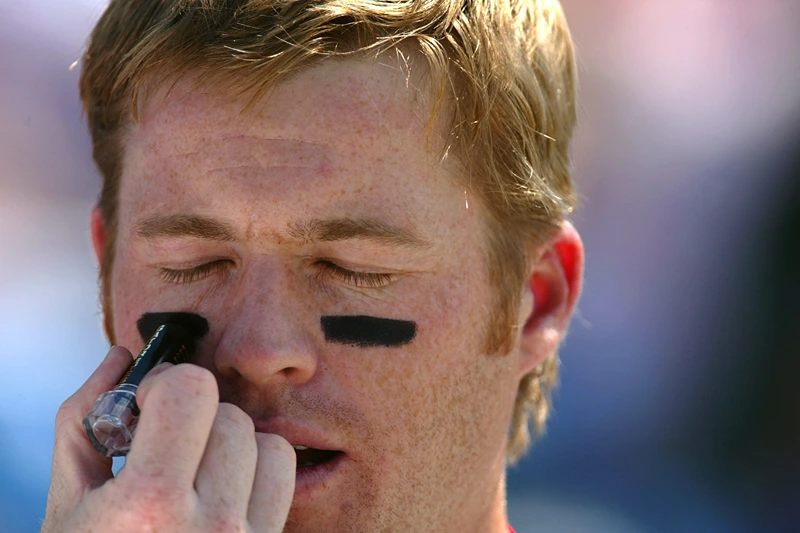 Cardinals v Dodgers
VERO BEACH, FL - MARCH 11: Bo Hart #31 of the St. Louis Cardinals has non-reflective eye-black paint rolled on his face before ar Spring Training game against the Los Angeles Dodgers on March 11, 2004 in Vero Beach, Florida. (Photo by Donald Miralle/Getty Images)
