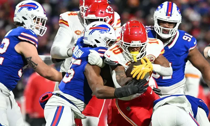 Kansas City Chiefs running back Isiah Pacheco (10) rushes the ball against the Buffalo Bills in the first half of the 2024 AFC divisional round game at Highmark Stadium. Mandatory Credit: Mark Konezny-USA TODAY Sports