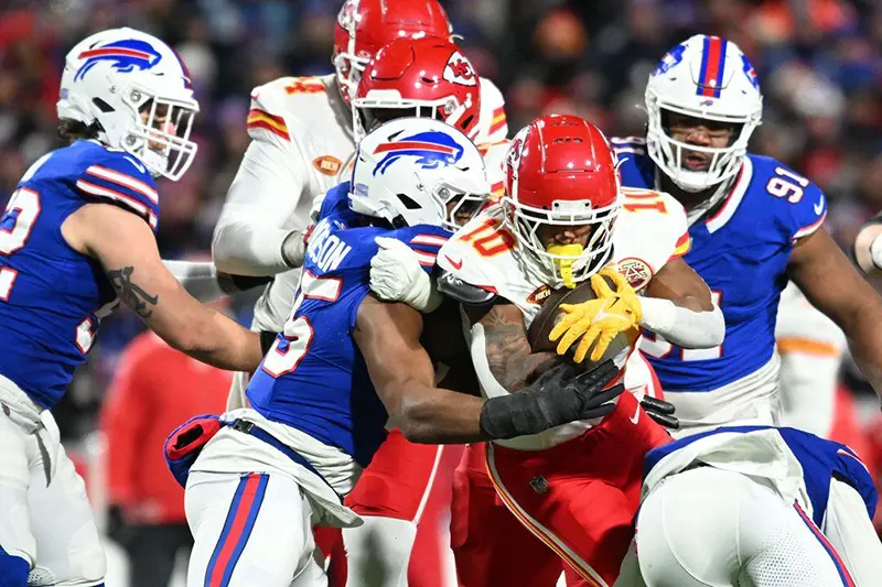Kansas City Chiefs running back Isiah Pacheco (10) rushes the ball against the Buffalo Bills in the first half of the 2024 AFC divisional round game at Highmark Stadium. Mandatory Credit: Mark Konezny-USA TODAY Sports
