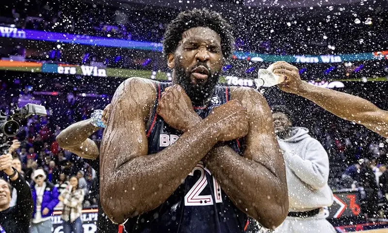 Philadelphia 76ers center Joel Embiid (21) is doused with water by teammates after scoring 70 points in a victory against the San Antonio Spurs at Wells Fargo Center. Mandatory Credit: Bill Streicher-USA TODAY Sports/File Photo