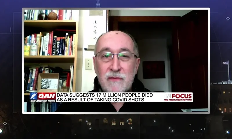 Video still from In Focus on One America News Network during an interview with the guest, Denis Rancourt.