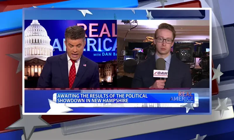 Video still from Real America on One America News Network showing a split screen of the host on the left side, and on the right side is the guest, Daniel Baldwin.