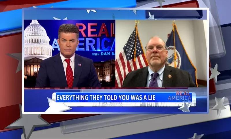 Video still from Real America on One America News Network showing a split screen of the host on the left side, and on the right side is the guest, Rep. Morgan Griffith.