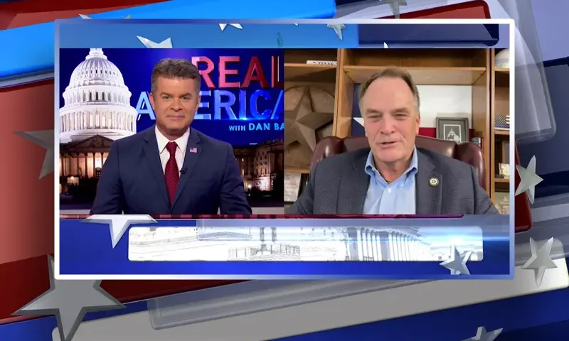 Video still from Real America on One America News Network showing a split screen of the host on the left side, and on the right side is the guest, Rep. Steve Toth.