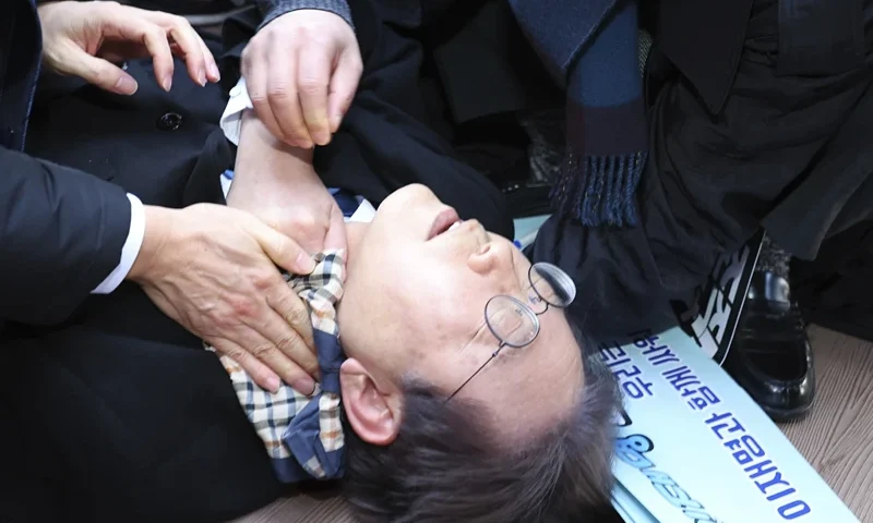 South Korean opposition leader Lee Jae-myung is seen after he was injured in Busan, South Korea, Tuesday, Jan. 2, 2024. Lee was attacked and injured by an unidentified man during a visit Tuesday to the southeastern city of Busan, emergency officials said. (Sohn Hyung-joo/Yonhap via AP)