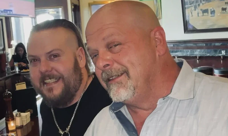 This undated photo provided by Laura Herlovich shows from left, Adam and Rick Harrison. Adam, one of three sons of reality TV show “Pawn Stars” celebrity Richard “Rick” Harrison, has died in Las Vegas, a family representative said Saturday, Jan. 20, 2024. He was 39. (Laura Herlovich via AP)
