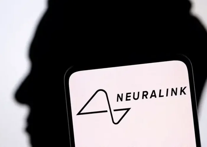 Neuralink logo and Elon Musk silhouette are seen in this illustration taken, December 19, 2022. REUTERS/Dado Ruvic/Illustration/File Photo