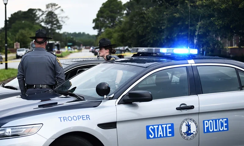 Virginia State Troopers guards a roadblock on June 1, 2019, at the scene of the mass shooting in the Virginia Beach Municipal center in Virginia, Beach, Virginia. - A municipal employee sprayed gunfire "indiscriminately" in the government building complex on May 31, 2019, police said, killing 12 people and wounding four in the latest mass shooting to rock the US. (Photo by Eric BARADAT / AFP) (Photo credit should read ERIC BARADAT/AFP via Getty Images)