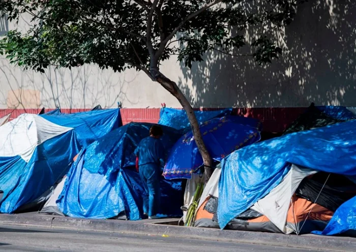 Tents line the street in Skid Row in Los Angeles, California on September 17, 2019. - US President Donald Trump has indicated he plans to address the homeless crisis in California as he lands later today in Los Angeles for a two-day visit with stops for fundraising in Palo Alto, Beverly Hills and San Diego. (Photo by Robyn Beck / AFP) (Photo credit should read ROBYN BECK/AFP via Getty Images)