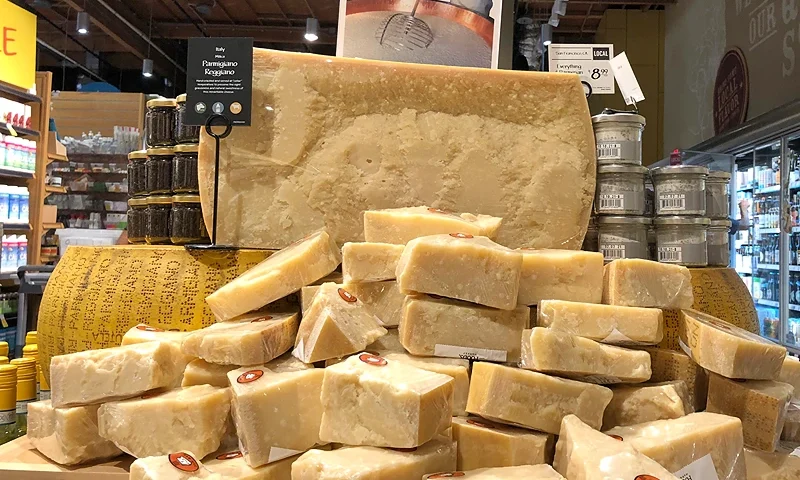 MILL VALLEY, CALIFORNIA - AUGUST 26: Parmigiano Reggiano cheese imported from Italy is displayed at a Whole Foods store on August 26, 2019 in Mill Valley, California. The United States has proposed retaliatory tariffs on several European products including cheese, olive oil, and wine that could be as much as 100 percent. The tariffs are in response to the European Union's subsidies to European aircraft manufacturer Airbus. Tariffs could (Photo by Justin Sullivan/Getty Images)
