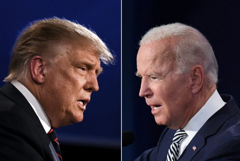 TOPSHOT - (COMBO) This combination of pictures created on September 29, 2020 shows US President Donald Trump (L) and Democratic Presidential candidate former Vice President Joe Biden squaring off during the first presidential debate at the Case Western Reserve University and Cleveland Clinic in Cleveland, Ohio on September 29, 2020. (Photo by JIM WATSON and SAUL LOEB / AFP) (Photo by JIM WATSONSAUL LOEB/AFP via Getty Images)