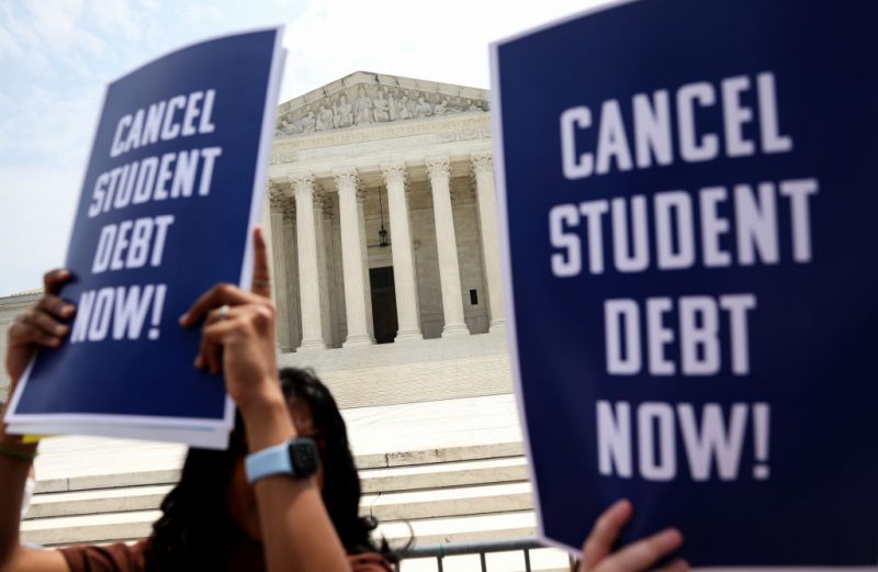 WASHINGTON, DC - JUNE 30: Student debt relief activists participate in a rally at the U.S. Supreme Court on June 30, 2023 in Washington, DC. In a 6-3 decision the Supreme Court struck down the Biden administration’s student debt forgiveness program in Biden v. Nebraska. (Photo by Kevin Dietsch/Getty Images)