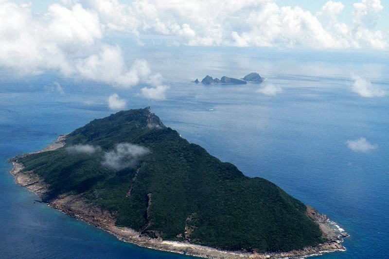 This aerial shot taken on September 15, 2010 shows the disputed islands known as Senkaku in Japan and Diaoyu in China in the East China Sea. China pledged on September 5, 2012 to take "necessary measures" to defend its territory after Japanese media said Tokyo had agreed to buy a contested group of islands. AFP PHOTO / JIJI PRESS JAPAN OUT (Photo credit should read JIJI PRESS/AFP/GettyImages)