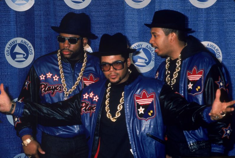 American rap group Run DMC pose at the Grammy Awards, 1980s. (L-R): Jam Master Jay (Jason Mizell), Joe 'Run' Simmons and Darryl 'DMC' McDaniels. (Photo by Hulton Archive/Getty Images)