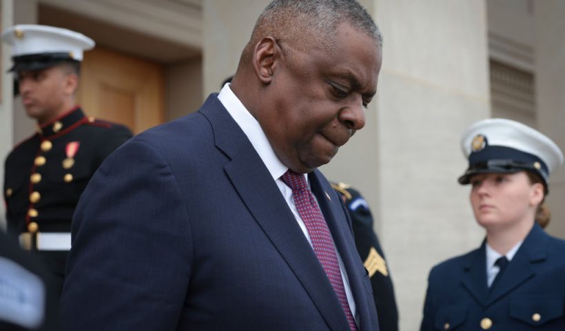 ARLINGTON, VIRGINIA - DECEMBER 04: U.S. Secretary of Defense Lloyd Austin walks down the steps of the Pentagon to greet Romanian Prime Minister Marcel Ciolacu on December 4, 2023 in Arlington, Virginia. Ciolacu and Austin were scheduled to discuss a range of bilateral issues. (Photo by Win McNamee/Getty Images)