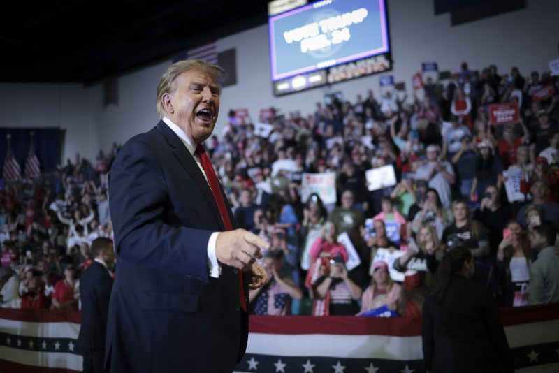 CONWAY, SOUTH CAROLINA - FEBRUARY 10: Republican presidential candidate and former President Donald Trump gestures to members of the audience as he leaves a Get Out The Vote rally at Coastal Carolina University on February 10, 2024 in Conway, South Carolina. South Carolina holds its Republican primary on February 24. (Photo by Win McNamee/Getty Images)