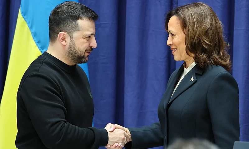 Ukrainian President Volodymyr Zelensky and US Vice President Kamala Harris shake hands at the end of a press conference at the Munich Security Conference (MSC) in Munich, southern Germany on February 17, 2024. (Photo by WOLFGANG RATTAY / POOL / AFP) (Photo by WOLFGANG RATTAY/POOL/AFP via Getty Images)