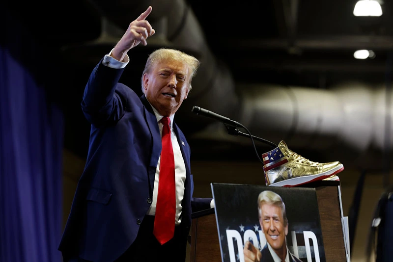 The Man Who Won Trump’s Signed Sneakers and the Falsehoods Surrounding Him