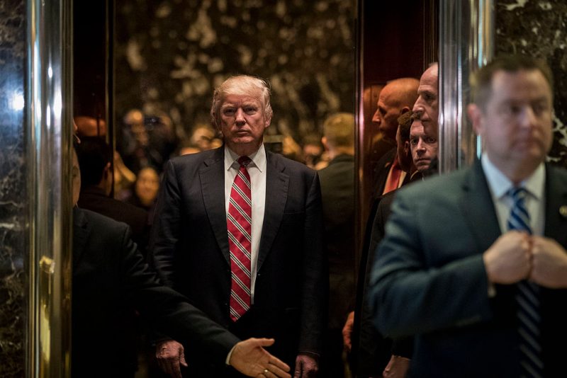 NEW YORK, NY - JANUARY 16: President-elect Donald Trump heads back into the elevator after shaking hands with Martin Luther King III after their meeting at Trump Tower, January 16, 2017 in New York City. Trump will be inaugurated as the next U.S. President this coming Friday. (Photo by Drew Angerer/Getty Images)