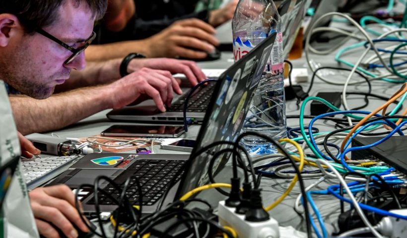 People work at computers during the 10th International Cybersecurity Forum in Lille on January 23, 2018. (Photo by Philippe HUGUEN / AFP) (Photo by PHILIPPE HUGUEN/AFP via Getty Images)