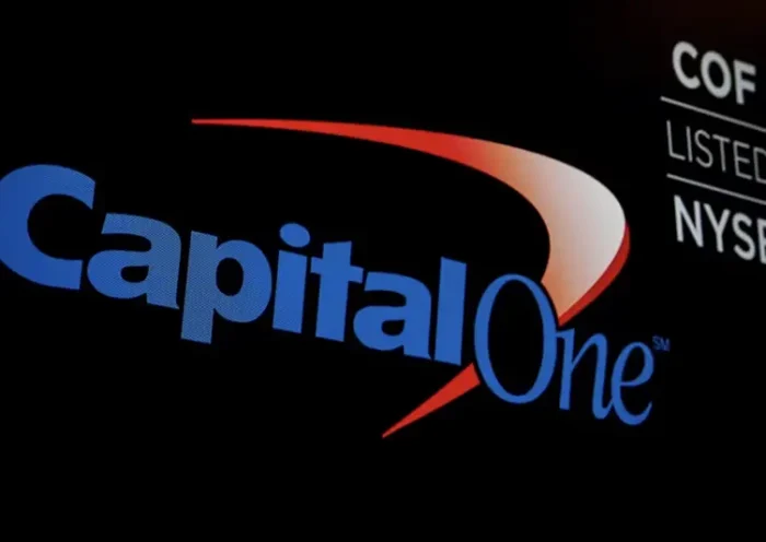 The logo and ticker for Capital One are displayed on a screen on the floor of the New York Stock Exchange (NYSE) in New York, U.S., May 21, 2018. REUTERS/Brendan McDermid/File Photo