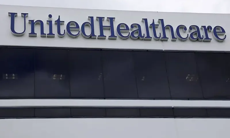 The corporate logo of the UnitedHealth Group appears on the side of one of their office buildings in Santa Ana, California, U.S., April 13, 2020. REUTERS/Mike Blake/File Photo