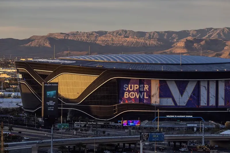 The rising sun illuminates the Allegiant Stadium, where Super Bowl LVIII will take place, in Las Vegas, Nevada, U.S., January 24, 2024. REUTERS/Carlos Barria/File Photo