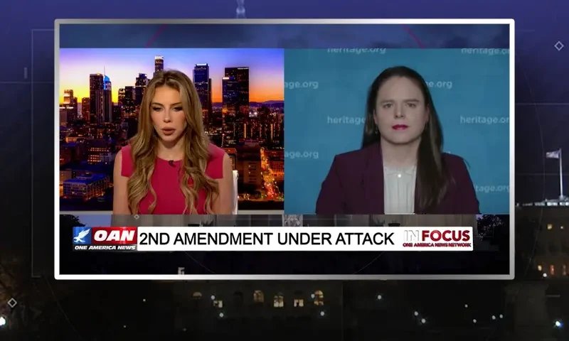 Video still from In Focus on One America News Network showing a split screen of the host on the left side, and on the right side is the guest, Amy Swearer.