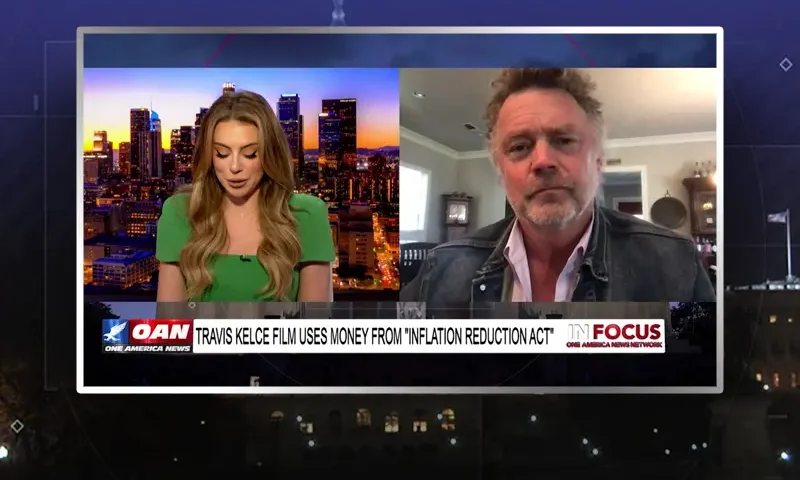 Video still from In Focus on One America News Network showing a split screen of the host on the left side, and on the right side is the guest, John Schneider.