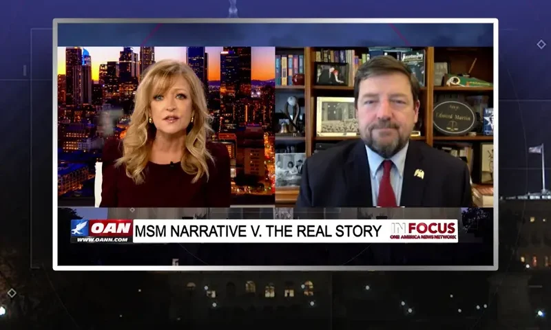 Video still from In Focus on One America News Network showing a split screen of the host on the left side, and on the right side is the guest, Ed Martin.