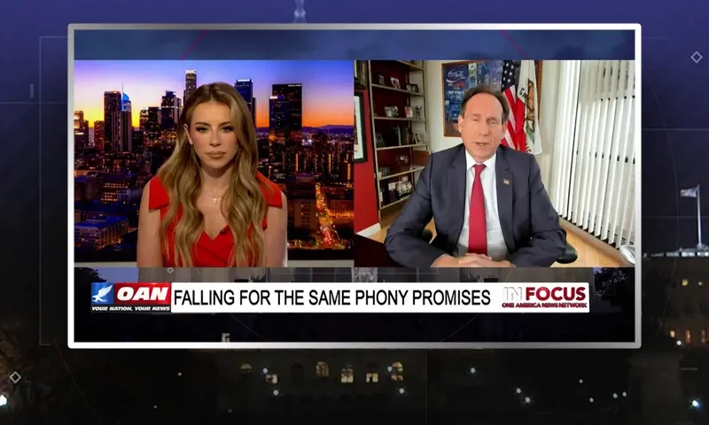 Video still from In Focus on One America News Network showing a split screen of the host on the left side, and on the right side is the guest, Eric Early.