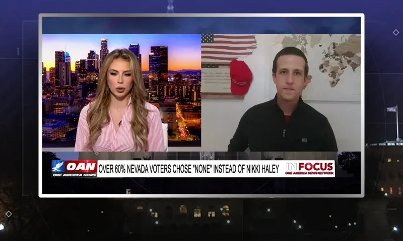 Video still from In Focus on One America News Network showing a split screen of the host on the left side, and on the right side is the guest, Frankie Stockes.