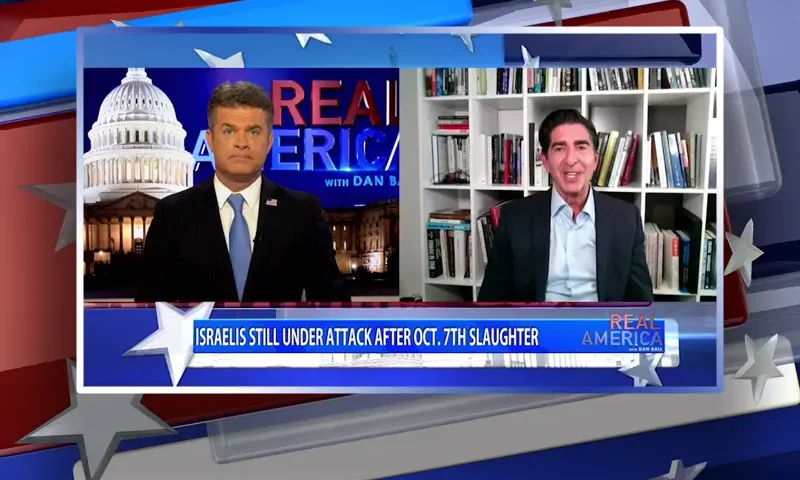 Video still from Real America on One America News Network showing a split screen of the host on the left side, and on the right side is the guest, Harley Lippman.