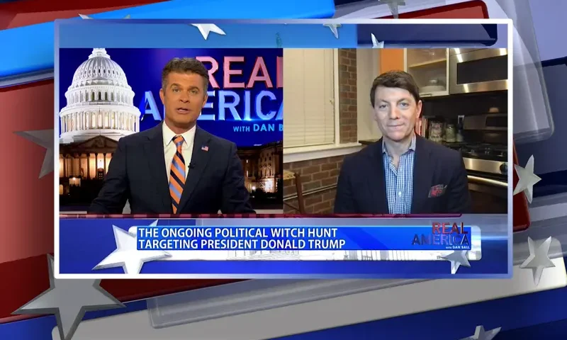 Video still from Real America on One America News Network showing a split screen of the host on the left side, and on the right side is the guest, Hogan Gidley.