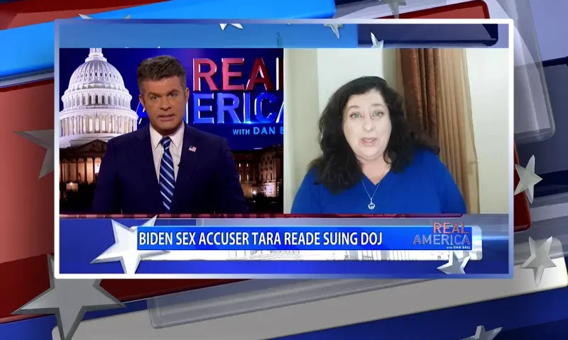Video still from Real America on One America News Network showing a split screen of the host on the left side, and on the right side is the guest, Tara Reade.