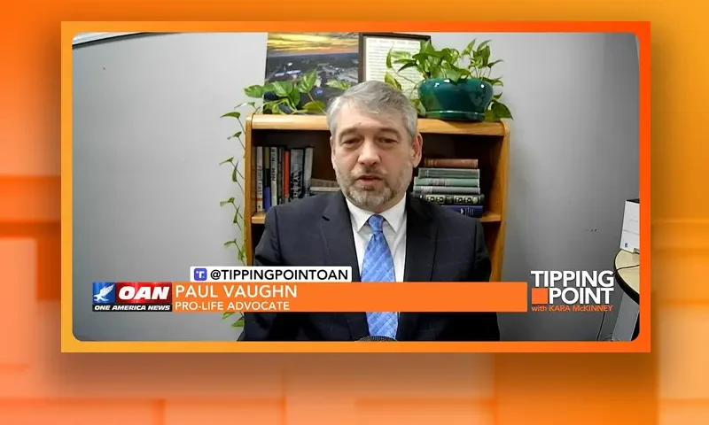 Video still from Tipping Point on One America News Network during an interview with the guest, Paul Vaughn.