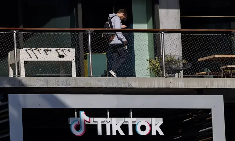 A person arrives at the offices of Tik Tok after the U.S. House of Representatives overwhelmingly passed a bill that would give TikTok's Chinese owner ByteDance about six months to divest the U.S. assets of the short-video app or face a ban, in Culver City, California, U.S., March 13, 2024. REUTERS/Mike Blake/FILE PHOTO