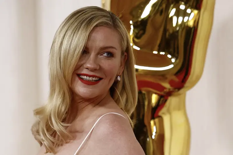 Kirsten Dunst poses on the red carpet during the Oscars arrivals at the 96th Academy Awards in Hollywood, Los Angeles, California, U.S., March 10, 2024. REUTERS/Sarah Meyssonnier/File Photo