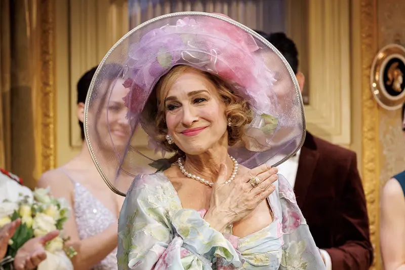 Sarah Jessica Parker greets attendees during curtain call for her new play "Plaza Suite" on opening night in New York, U.S., March 28, 2022. REUTERS/Eduardo Munoz/File Photo