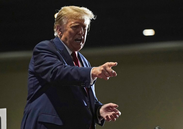 Republican presidential candidate former President Donald Trump gestures to supporters at a campaign rally Saturday, March 2, 2024, in Richmond, Va. (AP Photo/Steve Helber)