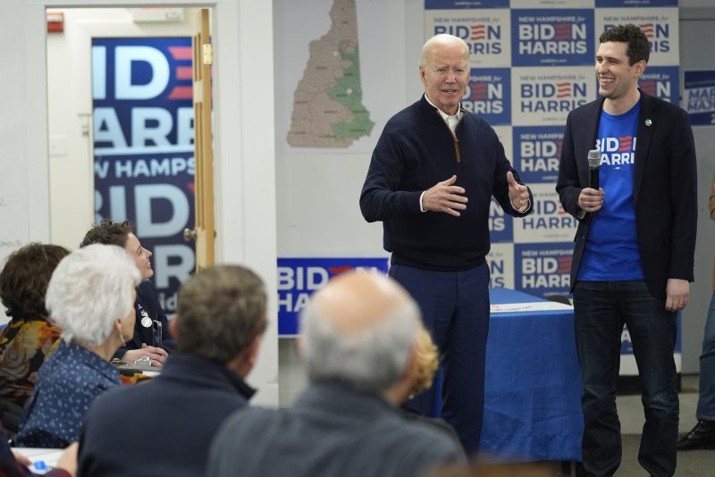 President Joe Biden, second right, greets supporters during a visit to a campaign field office, Monday, March 11, 2024, in Manchester, N.H. (AP Photo/Evan Vucci)